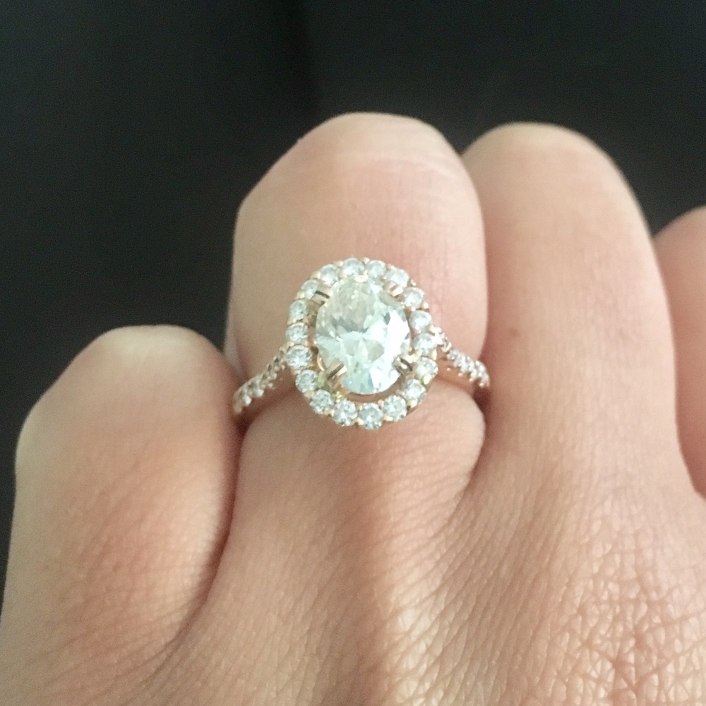 1.41 carat oval center w/rose gold pavé halo band